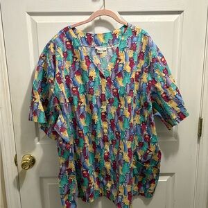 The Best of Uniforms Women’s Scrub shirt with multi color cat pattern